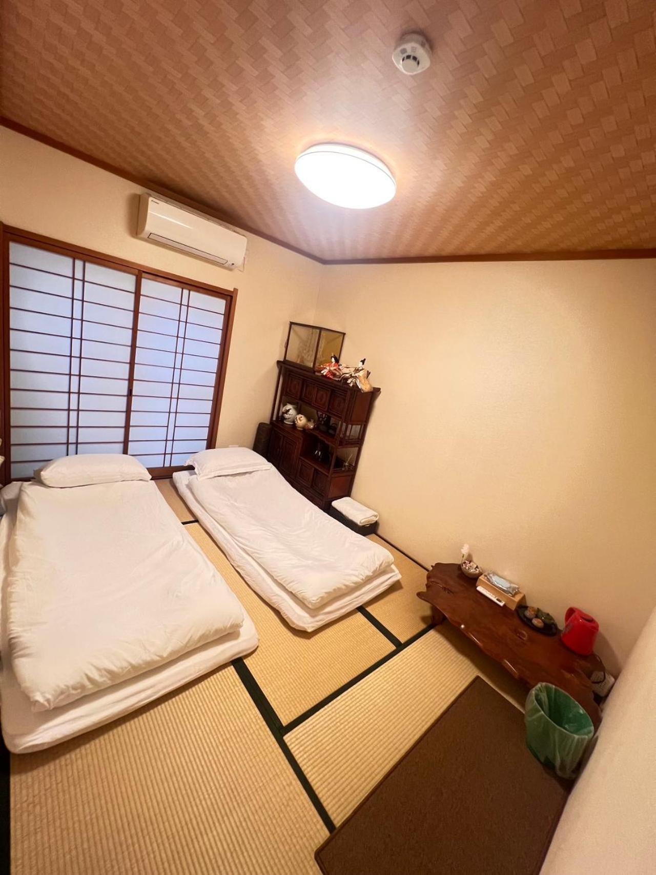 柒潜の宿 Osaka Esterno foto